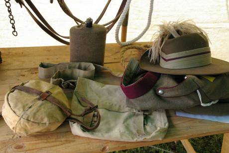 Original World War 1 items - water bottle, slouch hat and round mess kit containing a dixie